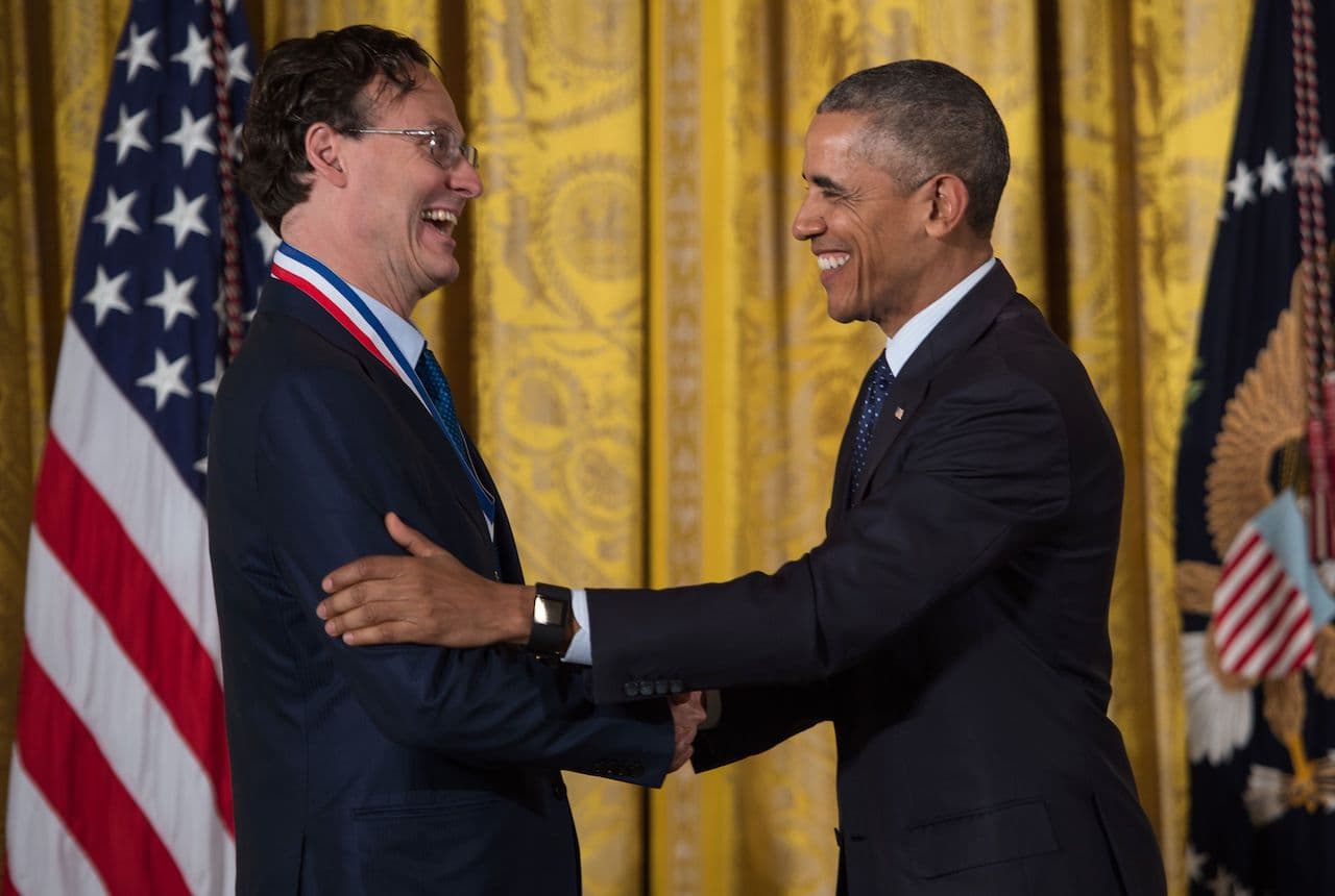 Dr. Jonathan Rothberg shaking hands with President Obama